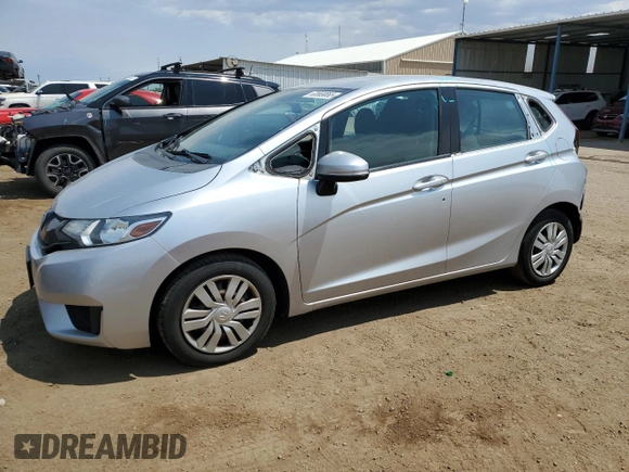 2015 Honda Fit LX with VIN 3HGGK5H59FM709104, listed as a Copart auction lot 63569065 with 101,859 mi miles and Salvage title. Bid and sale history available at DreamBid. Image 1.