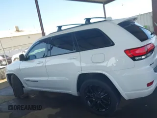 2018 Jeep Grand Cherokee Laredo E with VIN 1C4RJFAG5JC303228, listed as a IAAI auction lot 42375212 with 98,155 mi miles and . Bid and sale history available at DreamBid. Image 14.