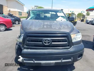 2013 Toyota Tundra z VIN 5TFRM5F15DX053654, wystawiony jako IAAI lot #42324593 z przebiegiem 128 206 mil mil oraz . Historia ofert i sprzedaży dostępna na DreamBid. Obrazek 12.