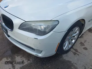 2011 BMW 7 Series 750Li with VIN WBAKB8C57BCY66558, listed as a IAAI auction lot 41494697 with 102,560 mi miles. Bid and sale history available at carsss.com. Image 6.