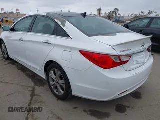 2013 Hyundai Sonata Limited with VIN 5NPEC4AC2DH684068, listed as a IAAI auction lot 41899879 with 151,585 mi miles and . Bid and sale history available at DreamBid. Image 3.