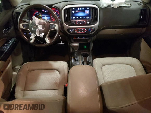 2015 GMC Canyon 4WD SLE z VIN 1GTG6BE3XF1242163, wystawiony jako Copart lot #57132035 z przebiegiem 110 241 mil mil oraz Szkoda całkowita • Salvage title. Historia ofert i sprzedaży dostępna na DreamBid. Obrazek 8.