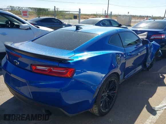 2017 Chevrolet Camaro 1LT z VIN 1G1FB1RS2H0158584, wystawiony jako IAAI lot #40488502 z przebiegiem 92 684 mil mil oraz . Historia ofert i sprzedaży dostępna na DreamBid. Obrazek 4.