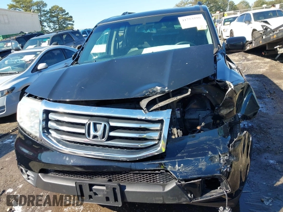 2015 Honda Pilot Touring with VIN 5FNYF3H97FB016390, listed as a IAAI auction lot 41753590 with 217,156 mi miles. Bid and sale history available at carsss.com. Image 12.