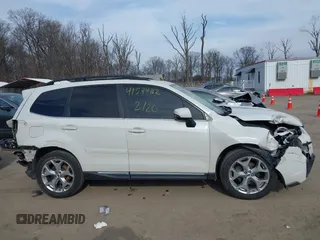 2018 Subaru Forester Touring z VIN JF2SJAWC0JH435392, wystawiony jako IAAI lot #41584762 z przebiegiem 92 151 mil mil oraz . Historia ofert i sprzedaży dostępna na DreamBid. Obrazek 13.