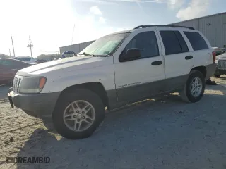 2002 Jeep Grand Cherokee Laredo with VIN 1J4GW48S12C312348, listed as a Copart auction lot 51786715 with 229,698 mi miles and Clean Title. Bid and sale history available at carsss.com. Image 1.