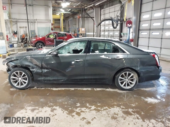 2017 Cadillac CTS Luxury AWD with VIN 1G6AX5SS5H0175404, listed as a IAAI auction lot 41584754 with 231,354 mi miles and . Bid and sale history available at DreamBid. Image 14.