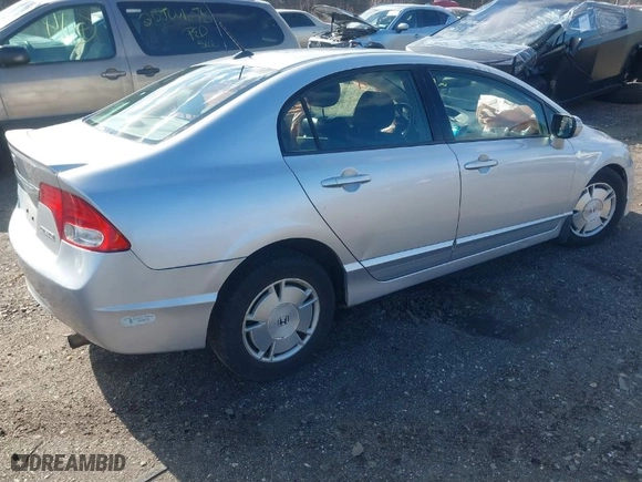 2009 Honda Civic Hybrid with VIN JHMFA36219S011249, listed as a IAAI auction lot 41605489 with 164,920 mi miles. Bid and sale history available at carsss.com. Image 4.