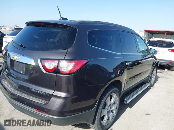 2016 Chevrolet Traverse LT with VIN 1GNKRGKD4GJ326001, listed as a IAAI auction lot 41826843 with 87,274 mi miles. Bid and sale history available at carsss.com. Image 4.