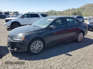 2012 Volkswagen Jetta SEL with VIN 3VWLP7AJ0CM327814, listed as a Copart auction lot 52235685 with 97,705 mi miles and Salvage title. Bid and sale history available at DreamBid. Image 1.