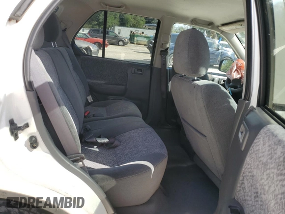 2002 Isuzu Rodeo S with VIN 4S2CK58W124322241, listed as a Copart auction lot 79009994 with 131,793 mi miles and Salvage Title. Bid and sale history available at DreamBid. Image 10.