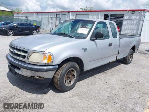 1998 Ford F-150 with VIN 1FTZX1767WNB79135, listed as a IAAI auction lot 42251761 with 221,839 mi miles and . Bid and sale history available at DreamBid. Image 2.