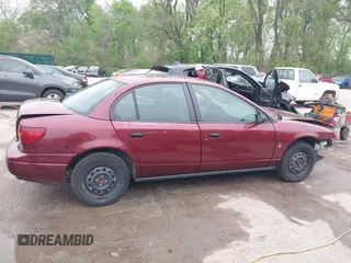 2001 Saturn SL z VIN 1G8ZH528X1Z355295, wystawiony jako IAAI lot #42057484 z przebiegiem 202 555 mil mil oraz . Historia ofert i sprzedaży dostępna na DreamBid. Obrazek 13.