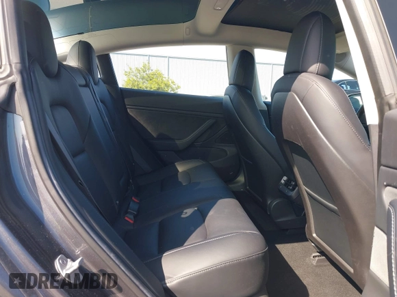 2018 Tesla Model 3 Long Range Battery with VIN 5YJ3E1EA4JF024102, listed as a IAAI auction lot 42100621 with 86,298 mi miles and . Bid and sale history available at DreamBid. Image 8.