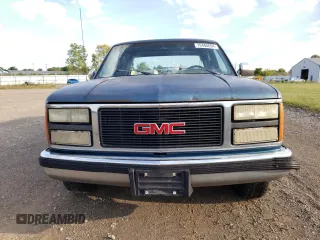1991 GMC Sierra 1500 with VIN 2GTEC19H2M1540763, listed as a Copart auction lot 70480694 with 379,189 mi miles and Salvage Title. Bid and sale history available at DreamBid. Image 5.