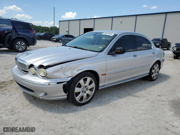 2005 Jaguar X-Type 3.0L with VIN SAJWA51C75WE23809, listed as a Copart auction lot 68457634 with 161,422 mi miles and Non Repairable. Bid and sale history available at carsss.com. Image 1.