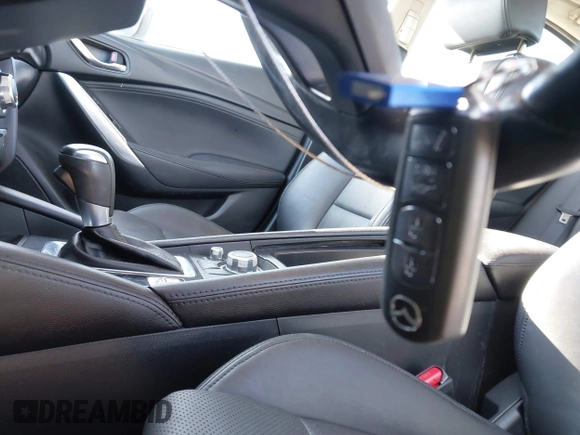 2017 Mazda 6 Touring with VIN JM1GL1V51H1126762, listed as a IAAI auction lot 41394606 with 62,072 mi miles and . Bid and sale history available at DreamBid. Image 11.