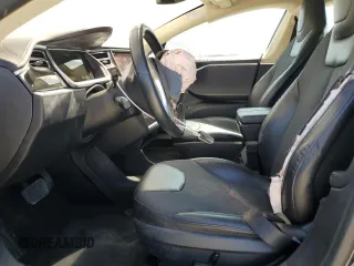 2013 Tesla Model S with VIN 5YJSA1AC9DFP10400, listed as a Copart auction lot 64096555 with 165,166 mi miles and Salvage title. Bid and sale history available at DreamBid. Image 7.