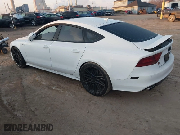 2014 Audi S7 Prestige with VIN WAUW2AFC1EN039425, listed as a IAAI auction lot 41803621 with 73,819 mi miles. Bid and sale history available at carsss.com. Image 3.