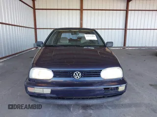 1997 Volkswagen Golf z VIN 3VWFA81H3VM089008, wystawiony jako IAAI lot #41821504 z przebiegiem 118 715 mil mil oraz . Historia ofert i sprzedaży dostępna na DreamBid. Obrazek 6.
