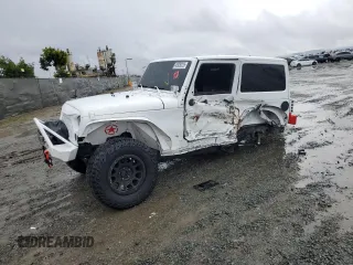 2013 Jeep Wrangler Sahara с VIN 1C4AJWBG7DL512437, выставлен на аукционе Copart как лот 48928325 с пробегом Не указан миль и Списание • Salvage title. История ставок и продаж доступна на DreamBid. Изображение 1.