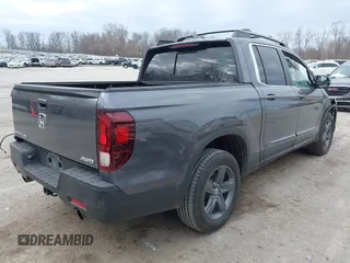 2023 Honda Ridgeline RTL z VIN 5FPYK3F58PB014460, wystawiony jako IAAI lot #41875307 z przebiegiem 77 565 mil mil oraz . Historia ofert i sprzedaży dostępna na DreamBid. Obrazek 4.
