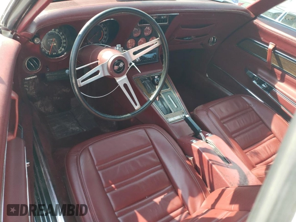 1974 Chevrolet Corvette with VIN 1Z67J4S405054, listed as a Copart auction lot 66356575 with 7,810 mi miles and Salvage title. Bid and sale history available at DreamBid. Image 8.