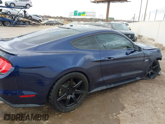 2018 Ford Mustang GT z VIN 1FA6P8CF0J5128561, wystawiony jako IAAI lot #41078319 z przebiegiem 72 615 mil mil oraz . Historia ofert i sprzedaży dostępna na DreamBid. Obrazek 13.