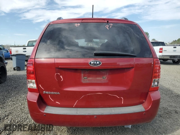 2011 Kia Sedona LX with VIN KNDMG4C72B6369858, listed as a Copart auction lot 70339124 with 165,640 mi miles and Salvage Title. Bid and sale history available at carsss.com. Image 6.
