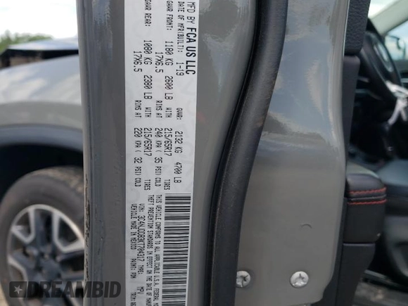 2019 Jeep Compass Trailhawk z VIN 3C4NJDDB3KT704317, wystawiony jako Copart lot #57116635 z przebiegiem 43 323 mil mil oraz Szkoda całkowita • Salvage title. Historia ofert i sprzedaży dostępna na DreamBid. Obrazek 13.