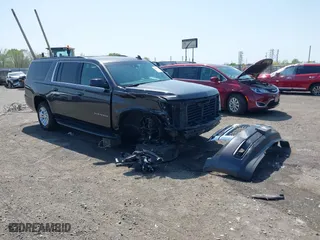 2018 Chevrolet Suburban LT with VIN 1GNSCHKCXJR128787, listed as a IAAI auction lot 41909965 with 123,020 mi miles. Bid and sale history available at carsss.com. Image 1.