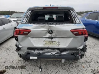 2023 Volkswagen Tiguan S with VIN 3VVRB7AX0PM107824, listed as a Copart auction lot 83444374 with 28,588 mi miles and Salvage title. Bid and sale history available at DreamBid. Image 6.