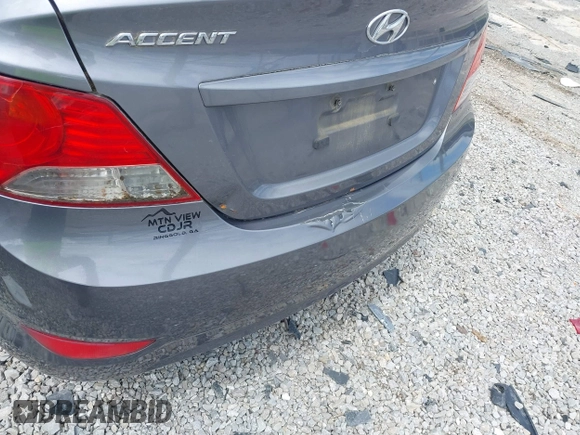 2014 Hyundai Accent GLS with VIN KMHCT4AE6EU670895, listed as a IAAI auction lot 42197066 with 142,983 mi miles and . Bid and sale history available at carsss.com. Image 13.