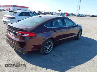 2017 Ford Fusion SE z VIN 3FA6P0H70HR198507, wystawiony jako IAAI lot #42033338 z przebiegiem 94 363 mil mil oraz . Historia ofert i sprzedaży dostępna na DreamBid. Obrazek 4.