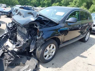 2010 Audi Q7 Premium Plus with VIN WA1LYAFE1AD002875, listed as a IAAI auction lot 42438514 with 124,548 mi miles and . Bid and sale history available at DreamBid. Image 2.