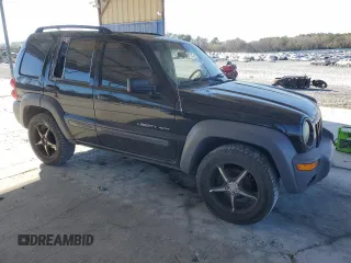 2003 Jeep Liberty Sport with VIN 1J4FK481X3W725304, listed as a Copart auction lot 87003384 with 185,646 mi miles and Salvage Title. Bid and sale history available at DreamBid. Image 4.