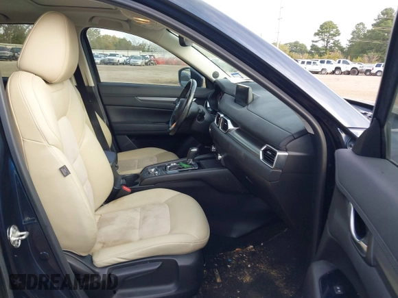 2018 Mazda CX-5 Touring z VIN JM3KFACM0J1389057, wystawiony jako IAAI lot #40922679 z przebiegiem 140 026 mil mil oraz . Historia ofert i sprzedaży dostępna na DreamBid. Obrazek 5.