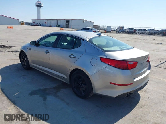 2015 Kia Optima LX with VIN 5XXGM4A78FG477630, listed as a IAAI auction lot 41771874 with 107,065 mi miles and . Bid and sale history available at DreamBid. Image 3.