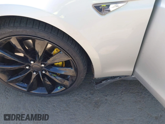 2013 Tesla Model S with VIN 5YJSA1CN5DFP11381, listed as a IAAI auction lot 42087803 with 146,818 mi miles and . Bid and sale history available at DreamBid. Image 6.