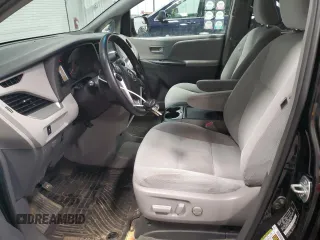 2016 Toyota Sienna LE with VIN 5TDJK3DC2GS129739, listed as a Copart auction lot 86125854 with 74,058 mi miles and Salvage Title. Bid and sale history available at carsss.com. Image 7.