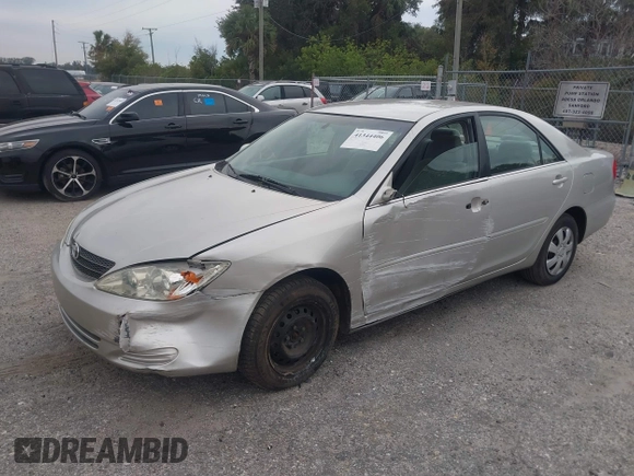 2004 Toyota Camry LE with VIN 4T1BE32K34U824059, listed as a IAAI auction lot 41344406 with 172,003 mi miles and . Bid and sale history available at DreamBid. Image 2.
