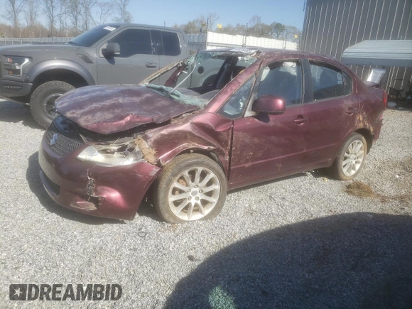 2011 Suzuki SX4 LE with VIN JS2YC5A21B6303222, listed as a Copart auction lot 50426895 with 56,236 mi miles and Salvage Title. Bid and sale history available at carsss.com. Image 1.