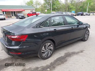 2020 Volkswagen Jetta SEL with VIN 3VWE57BU2LM081811, listed as a IAAI auction lot 42134394 with 96,121 mi miles and . Bid and sale history available at DreamBid. Image 4.
