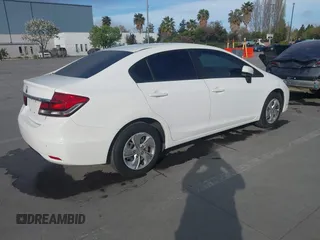 2014 Honda Civic LX with VIN 19XFB2F52EE200749, listed as a IAAI auction lot 42004489 with 213,818 mi miles and . Bid and sale history available at DreamBid. Image 4.
