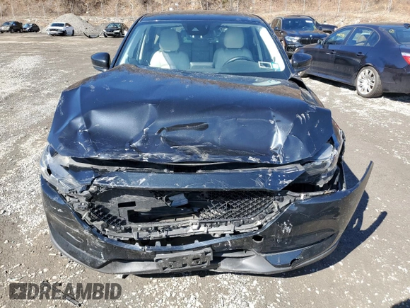 2017 Mazda CX-5 Grand Touring with VIN JM3KFBDL6H0211374, listed as a Copart auction lot 49079775 with 142,164 mi miles and Salvage Title. Bid and sale history available at carsss.com. Image 5.