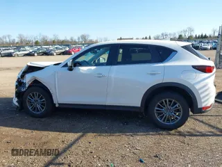 2017 Mazda CX-5 Touring with VIN JM3KFBCL4H0125501, listed as a IAAI auction lot 41979179 with 109,926 mi miles. Bid and sale history available at carsss.com. Image 15.
