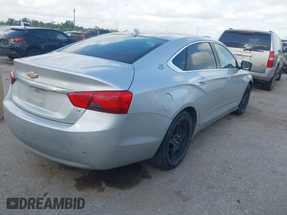 2014 Chevrolet Impala LT with VIN 2G1115SL9E9278164, listed as a IAAI auction lot 42087958 with 242,120 mi miles and . Bid and sale history available at DreamBid. Image 4.