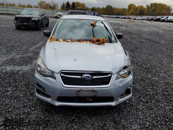 2016 Subaru Impreza z VIN JF1GJAA60GG006876, wystawiony jako Copart lot #79956994 z przebiegiem 118 240 mil mil oraz Szkoda całkowita • Salvage title. Historia ofert i sprzedaży dostępna na DreamBid. Obrazek 5.