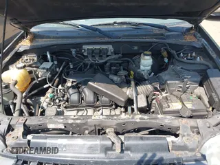 2005 Ford Escape XLT with VIN 1FMYU93155KA87661, listed as a IAAI auction lot 42491447 with 142,287 mi miles and . Bid and sale history available at DreamBid. Image 10.