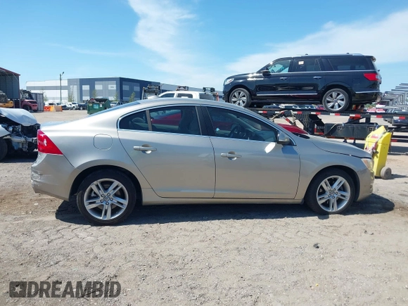 2015 Volvo S60 T5 Drive-E Premier Plus with VIN YV140MFC9F1318920, listed as a IAAI auction lot 41930684 with 66,790 mi miles. Bid and sale history available at carsss.com. Image 13.